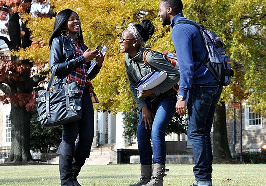 Students laughing on campus